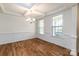 Dining room featuring coffered ceilings, wainscoting, and hardwood floors at 424 Preston Rd, Mooresville, NC 28117