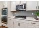 Modern kitchen appliances, white cabinets, and quartz countertops at 424 Preston Rd, Mooresville, NC 28117