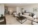 Bright living room with neutral tones, plush carpeting, and stylish furniture at 424 Preston Rd, Mooresville, NC 28117