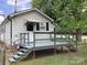 Charming back porch offers great area for outdoor living and relaxation with room for furniture at 4630 Roberta Rd, Concord, NC 28027