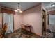Charming breakfast nook features natural light, classic wallpaper, and cozy dining space at 480 S Ingleside Farm Rd, Iron Station, NC 28080