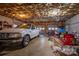 Attached garage with high ceilings offers plenty of room for parking and storage at 480 S Ingleside Farm Rd, Iron Station, NC 28080