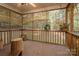 Relaxing screened porch boasts views of trees and nature at 480 S Ingleside Farm Rd, Iron Station, NC 28080