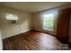 Cozy bedroom with hardwood floors, natural light, and ample space at 4817 Ridgeley Dr, Charlotte, NC 28208