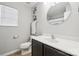 Bathroom features a single vanity, shower, and natural light at 509 Ellingsworth Ln, Charlotte, NC 28214