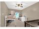 Bright bedroom featuring carpeted floors, a window, and a charming loft bed, creating a cozy space at 522 Kittiewake Ln, Clover, SC 29710