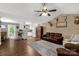 Spacious living room with hardwood floors, comfortable seating, and ample natural light at 522 Kittiewake Ln, Clover, SC 29710