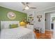Serene bedroom with hardwood floors, white trim, and a cozy full-sized bed at 530 Bonita Dr, Landis, NC 28088