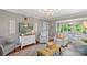 Open-concept living room with hardwood floors and access to a dining space at 530 Bonita Dr, Landis, NC 28088