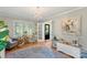 Office space featuring hardwood flooring, natural light, and elegant chandelier at 530 Bonita Dr, Landis, NC 28088