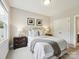 Cozy bedroom with neutral tones, plush carpeting, and a comfortable queen-sized bed at 5420 Meadowcroft Way, Fort Mill, SC 29708