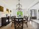 Spacious dining room with large wood table, decorative lighting, and a bright, airy feel at 5420 Meadowcroft Way, Fort Mill, SC 29708