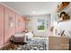 Cozy bedroom with a plush rug, dresser, decor, and natural light at 5528 Little Mountain Rd, Gastonia, NC 28056