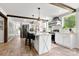 Well-lit kitchen with a central island, stainless steel appliances, and open layout at 5528 Little Mountain Rd, Gastonia, NC 28056