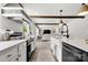 Modern kitchen with stainless steel appliances and view of living area at 5528 Little Mountain Rd, Gastonia, NC 28056