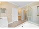 Bright bathroom with a soaking tub, vanity, and a standing shower at 5940 Four Wood Dr, Matthews, NC 28104