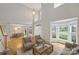 Spacious living room with high ceilings, hardwood floors, and ample natural light at 5940 Four Wood Dr, Matthews, NC 28104