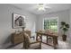 Cozy office with desk, chair, and view of the outdoors at 5940 Four Wood Dr, Matthews, NC 28104