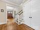 Welcoming foyer with hardwood floors, staircase, and view into other living spaces at 601 Dorothy Dr, Charlotte, NC 28203