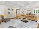 Spacious living room featuring coffered ceilings, neutral tones, and stylish decor at 601 Dorothy Dr, Charlotte, NC 28203