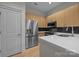 Well-equipped kitchen with stainless steel appliances, quartz countertops, and modern finishes at 625 N Alexander St, Charlotte, NC 28202