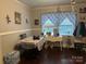 Comfortable living room featuring wood floors, a large window, and cozy decor at 6585 White St, Kershaw, SC 29067