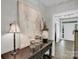 Inviting entryway with console table, decorative accents, and a view into the home at 7814 Knox Ridge Rd, Huntersville, NC 28078