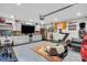 Finished garage with built in cabinets, tv, work out area and Clemson decor at 7814 Knox Ridge Rd, Huntersville, NC 28078