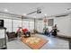 Finished garage featuring a seating area, work out space and painted floor at 7814 Knox Ridge Rd, Huntersville, NC 28078