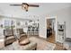 Open floorplan with hardwood floors, modern furnishings, a stylish kitchen, and an inviting dining area at 7814 Knox Ridge Rd, Huntersville, NC 28078