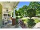 Covered porch with outdoor furniture and manicured landscaping views at 7814 Knox Ridge Rd, Huntersville, NC 28078
