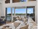Lake view living area with sliding glass doors to the outdoor porch at 8044 Edgewater Dr # 100, Norwood, NC 28128