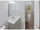 Bathroom features a white vanity and updated fixtures at 8600 Eaglewind Dr, Charlotte, NC 28212