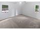Spacious bedroom with plush carpet, ample natural light, and a calming atmosphere at 8600 Eaglewind Dr, Charlotte, NC 28212