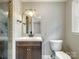 Nicely updated bathroom with stylish vanity, modern fixtures, and a glass-enclosed shower at 895 Furnace Rd, Iron Station, NC 28080