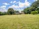 Ranch style house with a spacious front yard perfect for a Gathering looking for room to grow at 895 Furnace Rd, Iron Station, NC 28080