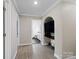 Open hallway with hard surface flooring and a built-in desk area at 895 Furnace Rd, Iron Station, NC 28080