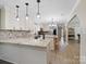 Spacious kitchen with granite counters, stainless steel appliances, and a large island at 895 Furnace Rd, Iron Station, NC 28080