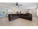 Spacious living room with seamless flow into the kitchen, dining area, and new luxury vinyl flooring at 895 Furnace Rd, Iron Station, NC 28080