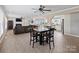 Open concept living room and kitchen with great flow and natural light at 895 Furnace Rd, Iron Station, NC 28080
