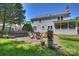 Backyard view featuring a charming patio area with outdoor seating, perfect for entertaining at 9209 Cameron Wood Dr, Charlotte, NC 28210