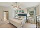 Serene main bedroom with large windows, soft lighting, and tasteful decor for a relaxing retreat at 9209 Cameron Wood Dr, Charlotte, NC 28210