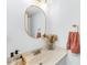 Stylish bathroom featuring a gold mirror, modern fixtures, and clean design at 9214 N Vicksburg Park Ct, Charlotte, NC 28210