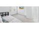 Comfortable bedroom featuring a window with blinds and neutral walls at 9214 N Vicksburg Park Ct, Charlotte, NC 28210