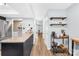 Open kitchen featuring modern granite countertops and stainless steel appliances at 9214 N Vicksburg Park Ct, Charlotte, NC 28210
