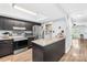 Well-equipped kitchen with granite countertops, modern appliances, and stylish cabinetry at 9214 N Vicksburg Park Ct, Charlotte, NC 28210