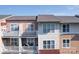 Exterior apartment building view with balconies, showing architectural details at 1000 E Woodlawn Rd # 402, Charlotte, NC 28209
