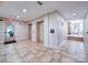Hallway with neutral flooring gives access to elevators and exits, ensuring easy navigation through the building at 1000 E Woodlawn Rd # 402, Charlotte, NC 28209