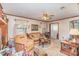 Inviting living room featuring comfortable seating, a ceiling fan, and vintage-style décor at 1009 N Main St, Mount Holly, NC 28120
