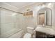 Inviting bathroom showcasing a glass shower door, new vanity, and decorative shelf at 118 Spicewood Cir, Troutman, NC 28166